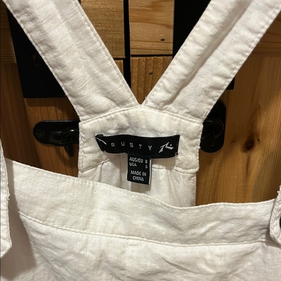 Rusty White Buttoned Strap Mini Dress - Picture 2 of 11